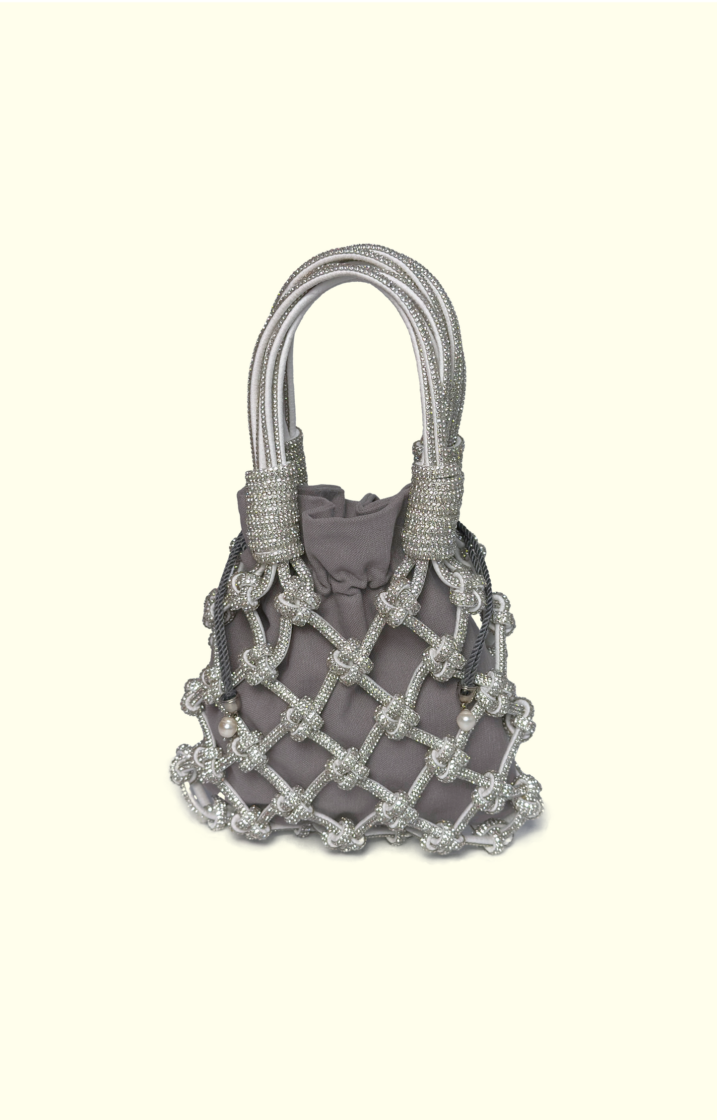 Gray handbag with a net-like design on a white background