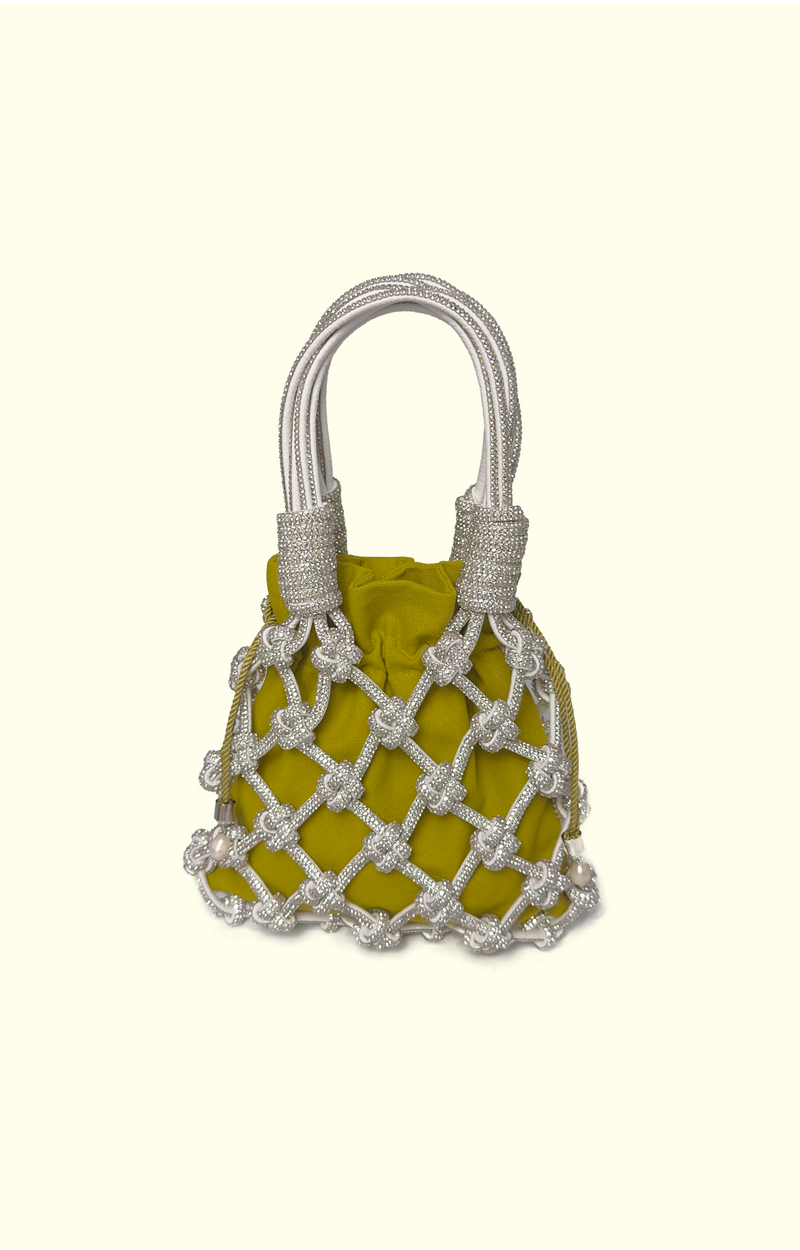 Yellow handbag with silver rope detailing on a white background
