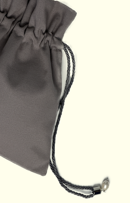 Gray drawstring bag on a white background