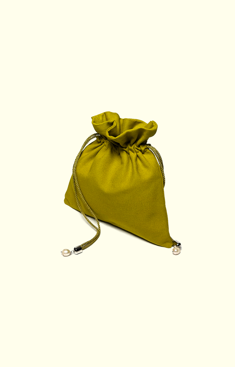 Green drawstring pouch on a white background